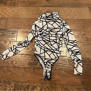 Avid Love Black and Tan Geometric Long Sleeve Bodysuit